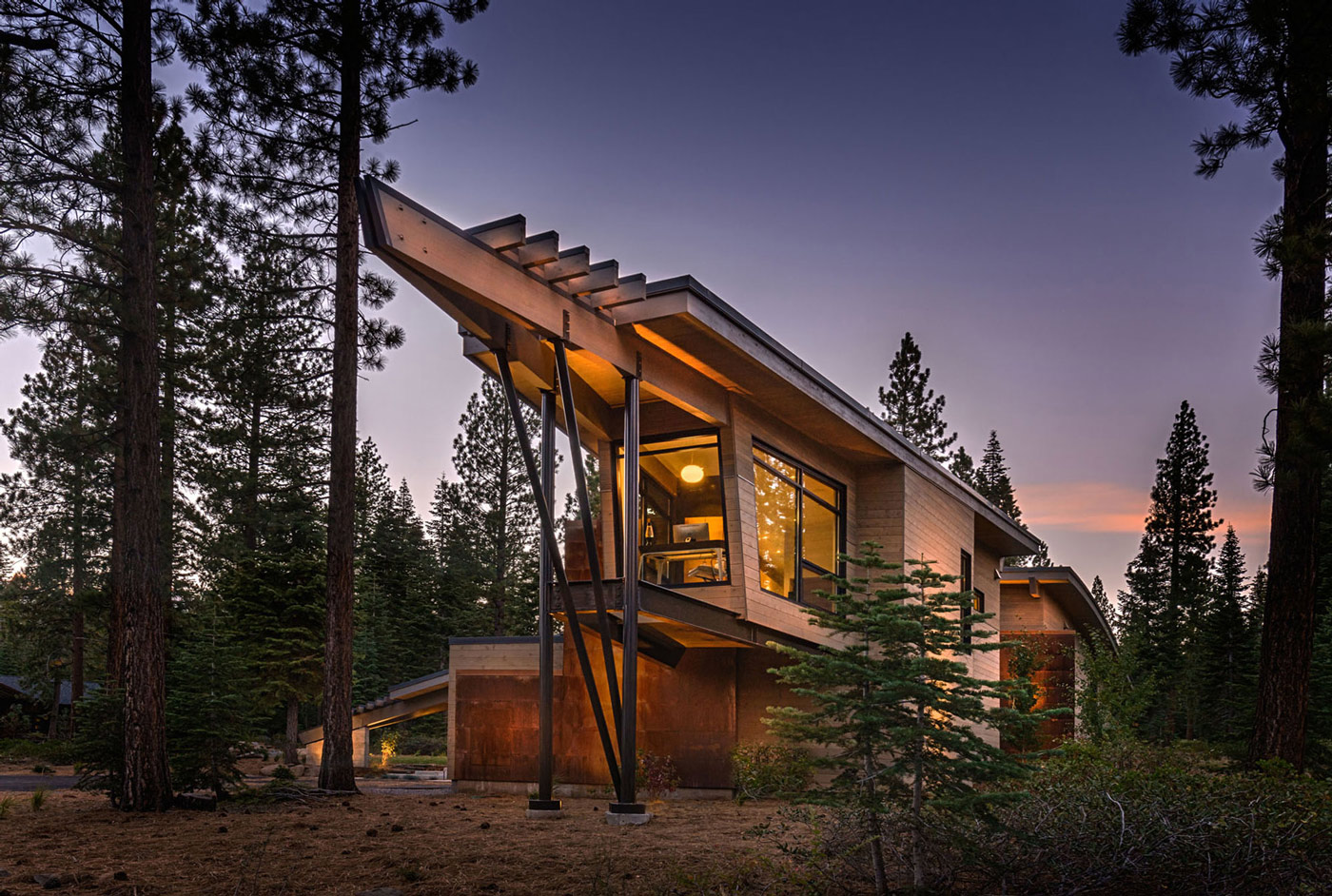 photo modern styled wood home taken at sunset